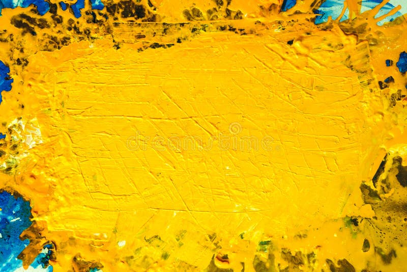 Yellow scratched dry paint abstract background. Creative abstract background. Contemporary artwork. Dry yellow paint splotch with scratched effect stock photography